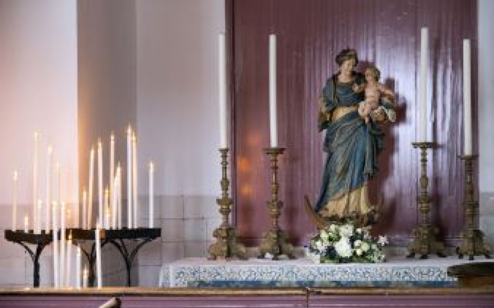 Museum Ons' Lieve Heer op Solder kaarsen in de kerk